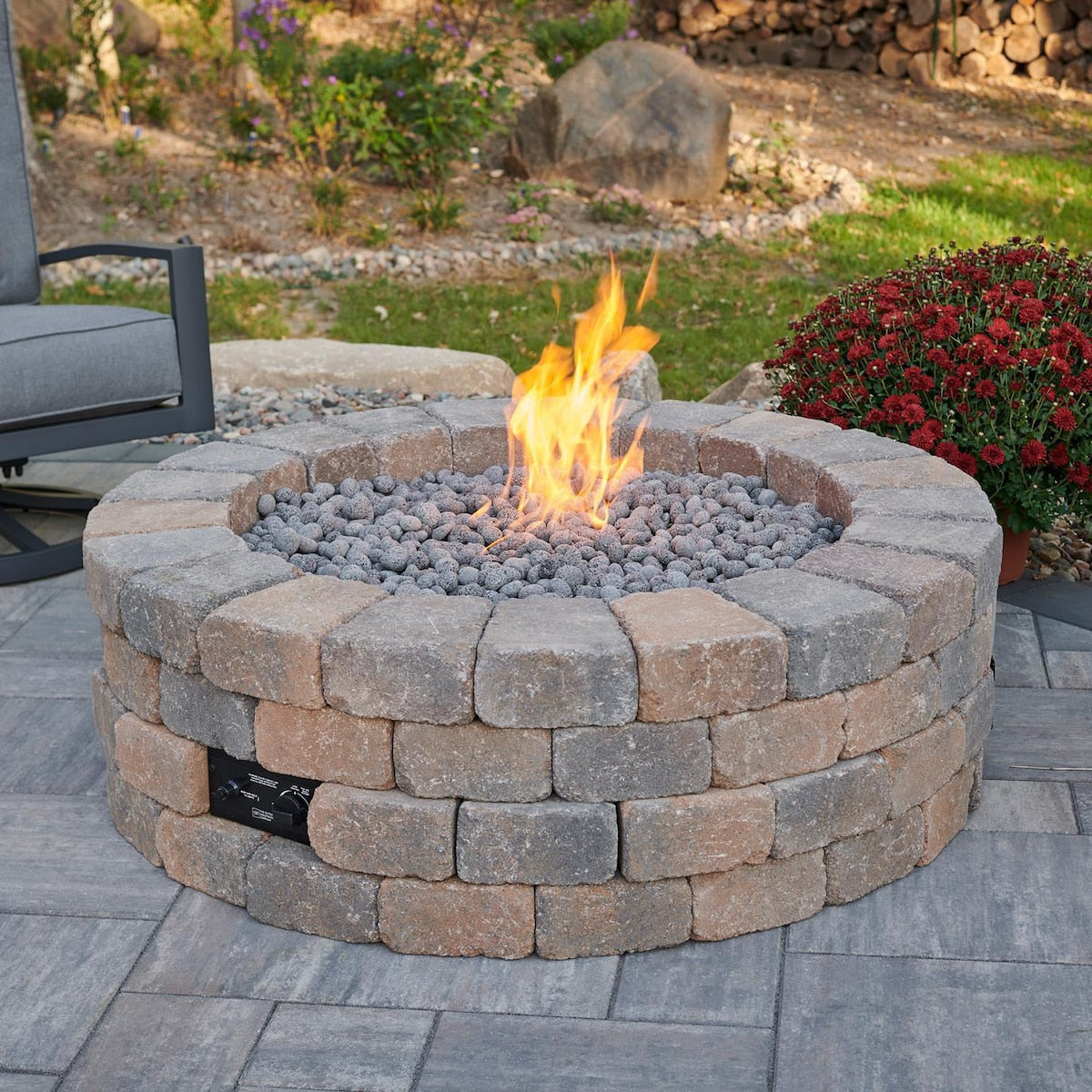 Abbey Bay 51 Inch Round Concrete Natural Gas Fire Pit in Brown by Lakeview Outdoor Designs